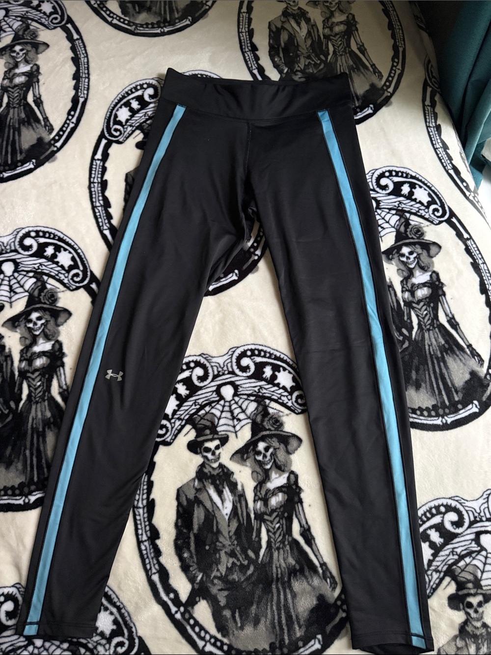Under Armour Black Leggings with Light Blue Side Panels (cold gear)